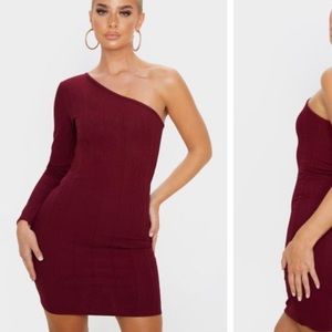 Burgundy one shoulder dress.